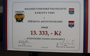 Detail symbolického šeku.
